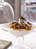Crepes with vanilla ice cream, caramel sauce and grated chocolate