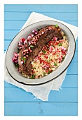 Moroccan beef fillet with pomegranate seeds and chilli couscous
