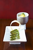 Asparagus with orange butter and Greek rice noodles