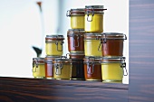Assorted stocks and soups in preserving jars