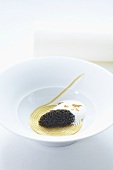 Veal stock pasta with bacon foam and caviar