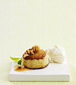 Apple dessert with nuts and vanilla ice cream (Sweden)