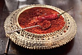 Chilli flakes in an Arabic bowl