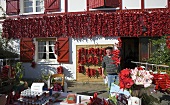 Dried chilli peppers in front of a house in Espelette, Basque Country