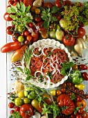Tomato salad with onions, fresh tomatoes and herbs