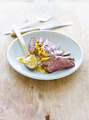 Grilled duck breast with orange sauce