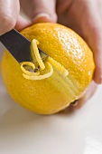 A lemon being zested