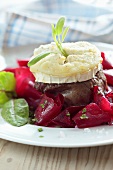 Beef steak with goat's cheese and beetroot salad