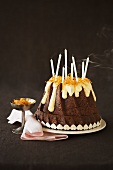 Chocolate Bundt cake with blown-out candles