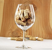 Wine corks in a red wine glass