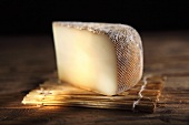 A slice of brebis, French sheep's cheese