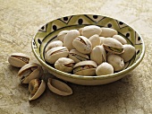 Pistachios in the shell in a dish