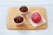 Red beets, red beet puree and pink noodle dough
