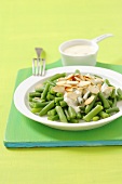 Green beans with Hollandaise sauce and slivered almonds