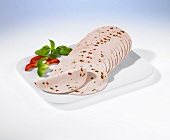 Sliced poultry Lyon sausage with pepper