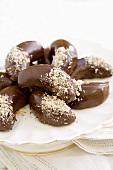 Haselnusskipferl (cresent-shaped hazelnut biscuits) with chocolate icing