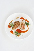 Spring chicken breast filled with pears and vegetables served with carrot juice