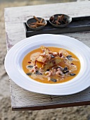 Pumpkin soup with North Sea prawns