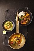 Green prawn curry, red duck curry and yellow vegetable curry (Thailand)