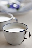 Milk in an enamel cup