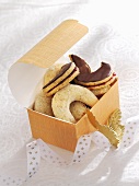 Vanillekipferl (cresent-shaped vanilla biscuits) and almond half moon biscuits