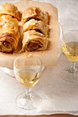 Strudel and two glasses of white wine