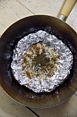 Ingredients for smoking tea in tin foil