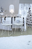 A dining room decorated for Christmas in black-and-white