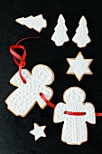 Shortbread biscuits with white icing (angels, stars and Christmas trees)