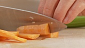 Carrots being diced