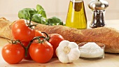 White bread, tomatoes, garlic, oil, pepper, basil and salt