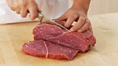 Shoulder of beef being sliced