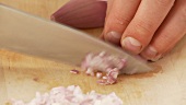 Shallots being diced