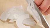 An onion being sliced