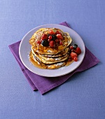 Buttermilk pancakes with maple syrup and berries