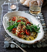 Grilled halloumi with wild rocket and tomatoes