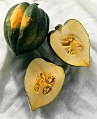 Two Acorn Squashes - one cut in half