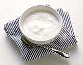 Bowl of Plain Yogurt on Striped Napkin