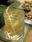 A Glass of Whisky and Ginger with a Lime Slice