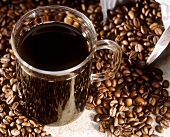 A Cup of Coffee with Coffee Beans