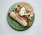 Two Bean and Vegetable Burritos; One Rolled One Unrolled