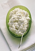 Cottage Cheese on a Green Dish; Spoon