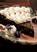 A Slice of Flourless Chocolate Cake with Frosting