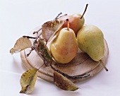 Three Pears on a Wooden Plate; Leaves