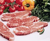 Four Steaks with Ingredients