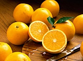 Whole Oranges with One Halved Orange/nSee Image #606481