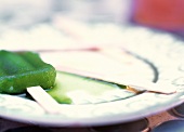 Melted Lime Popscicles on a Plate