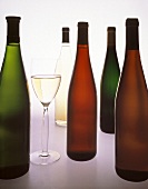 Assorted Wine Bottles with Glass of White Wine