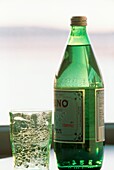 A Glass and Bottle of San Pellegrino