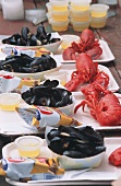 Lobster and Mussel Dinners on Paper Plates at Fair